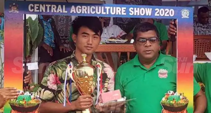 Young Farmer of the Year award recipient Kei Long Liu (second from left), with the Minister for Agriculture, Mahendra Reddy, during the Central-Eastern Agriculture Show 2020 at Syria Park, Nausori, on October 16, 2020. Photo: Lusiana Tuimaisala