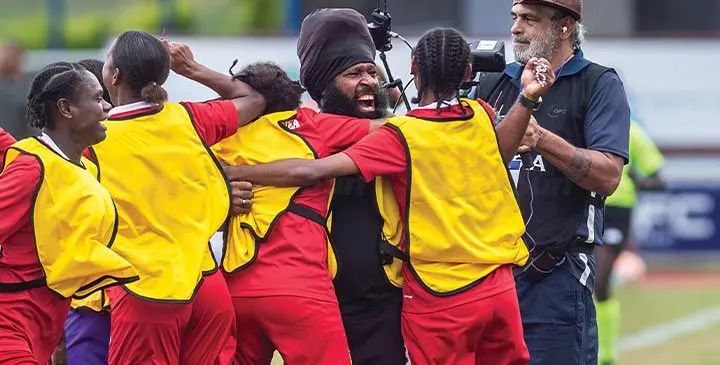 PNG's head coach Ericson Komeng celebrates with his player after they defeated Fiji Kulas 2-1 during the OFC Women's Nations Cup semi-final at the HFC Stadium, Suva. Photo: Josua Buredua