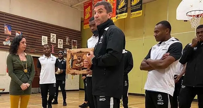 Fiji Airways Fijian 7s coach Gareth Baber during a school visit programme before the Canada Sevens tournament in Vancouver in March, this year. Players (left-right) Waisea Nacuqu, Vilimoni Botitu, Josua Vakurinabili and Alasio Naduva. Photo: FRU Media
