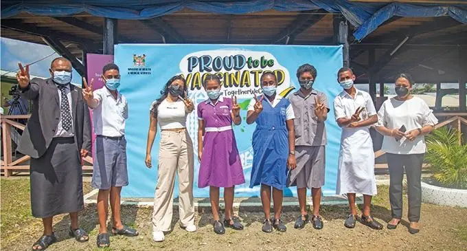 Proud to be Vaccinated …(from left) Minister for Health Ifereimi Waqainabete, John Raliga 13, (Gospel Primary School) , Malisha Prasad 14, ( Mahatma Gandhi Memorial ), Janet Snow, 13 (Dudley Intermediate School), Aralai Nabutu 12, ( Samabula Primary School), Isei Sageti 14, (Suva Grammar School) , Lekima Waqainabete 14 (Marist Brothers High School) and Minister for Education Premila Kumar during the Roll out of the  Pfizer vaccine for 12 – 14 year olds at Gospel Primary School in Suva, on November 15, 2021. Photo: Leon Lord