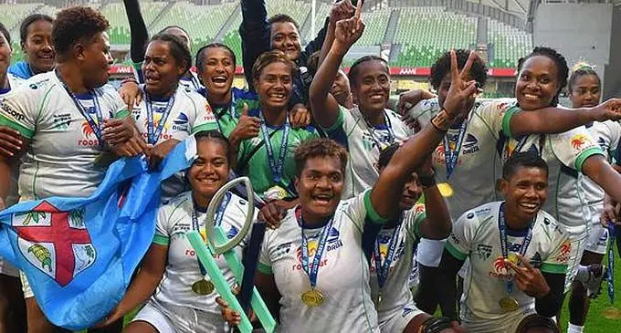 Rooster Chicken Fijiana Drua players with the Super W title after their win this year. Photo: Fox Sports