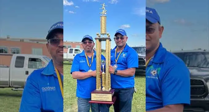 Canada Lautoka Soccer Association chairman David Rakesh (left) and president Rajesh Lingam with the IDC trophy. PHOTO SUPPLIED