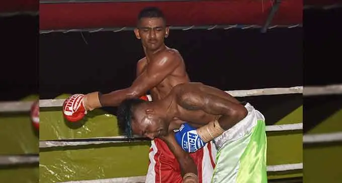 Junior ‘The Maverick’ Binnu Singh lands his punch on Rahul Aaron in their title fight at Prince Charles Park, Nadi, on July 9, 2022. Photo: Waisea Nasokia