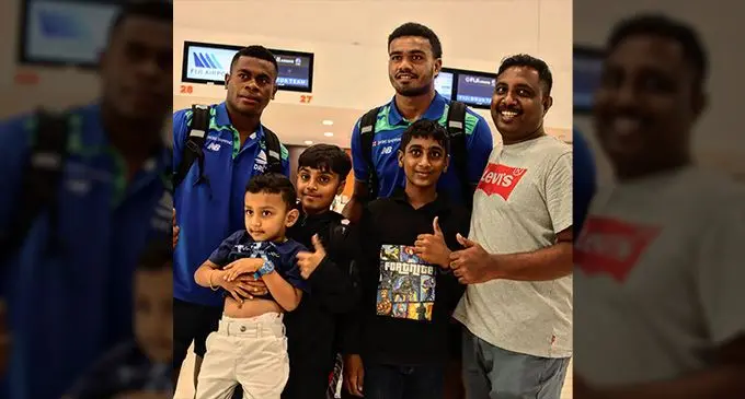 Swire Shipping Fijian Drua players (left-right) Taniela Rakuro and Iosefo Masi with fans at Nadi International Airport on March 2, 2023.Photo.Fijian Drua