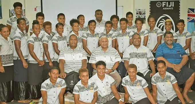 Fijiana 7s training squad with (sitting- left- right) Fitness trainer Tikiko Namaua, Prime Minister and Fiji Rugby Union president Voreqe Bainimarama, Fijiana 7s head coach Saiasi Fuli, Fiji Rugby Union chief executive officer John O’Connor at the Pacific Theological College in Nasese, Suva, on March 16, 2021. Photo: FRU Media