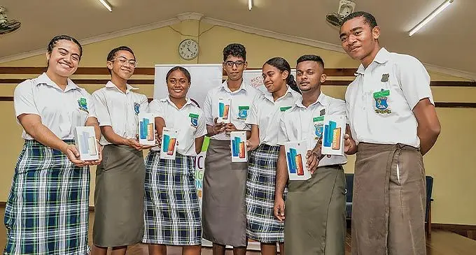 Jai Narayan students upon receiving their smart phones on November .