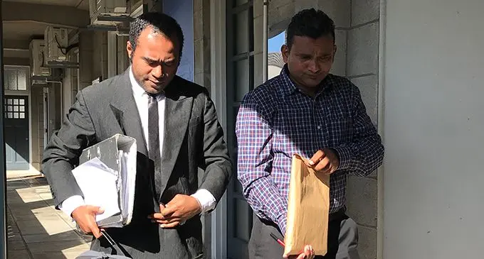 Anirudh Sharma (right), with his lawyer outside the Civil High Court in Suva on July 15, 2019. Photo: Ashna Kumar