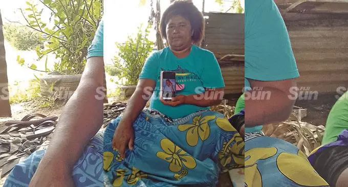 Avisaki Nacoro with a picture of her nephew Tikoisuva Paula who allegedly drowned at Serea Village in Naitasiri. Photo: Wati Talebula