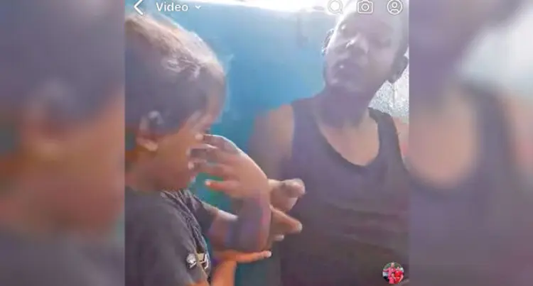 Video of a man alleged abuse of child