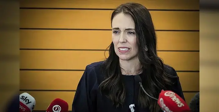 New Zealand Prime Minister Jacinda Ardern grimaces as she announces her resignation at a press conference in Napier, New Zealand. Fighting back tears, Ardern told reporters that February 7 will be her last day in office. Photo: AP