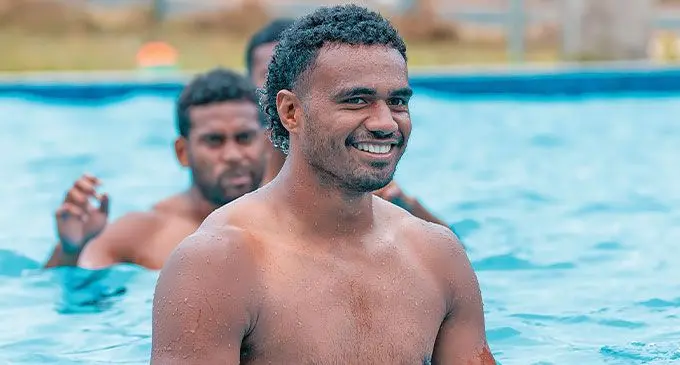 Swire Shipping Fijian Drua star centre, Iosefo Masi. Inset photo: Drua co-captain Frank Lomani. Photos: Fijian Drua