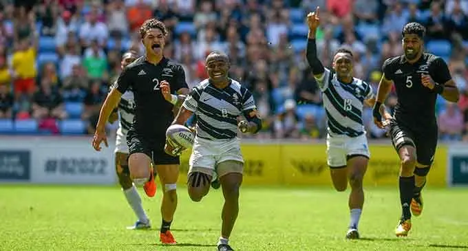 Team Fiji men’s rugby 7s captain Waisea Nacuqu in full flight with Sireli Maqala behind him in the 75-metre dash to score the winning try (during sudden death) against New Zealand in the Commonwealth Games semifinal at Coventry Stadium in Birmingham, England, on August 1, 2022. Fiji won 19-14 to make the final where they received the silver medal. Photo: Ian Muir