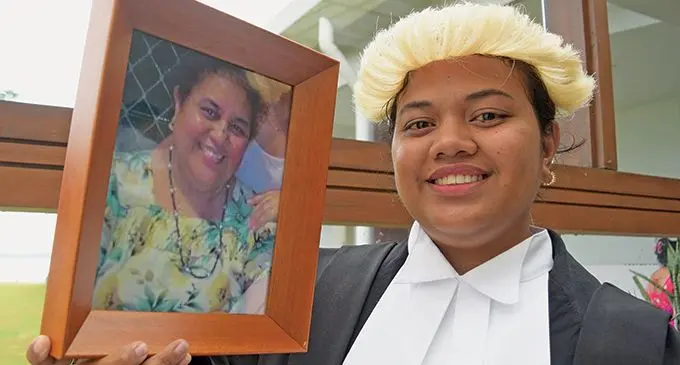 For my late mum... Fa’amelea Joan Awerika with the photo of her late mother, Pole Atanraoi following Ms Awerika’s admission to Bar at the Grand Pacific Hotel in Suva on September 22, 2023. Photo: Ronald Kumar