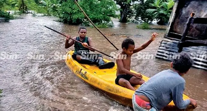 Vitogo villagers in Lautoka finding their way around the village area following the heavy downpour last week that caused flooding.