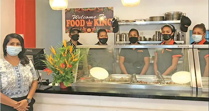 Food King restaurant co-director Leena Raman with her staff. Photo: Waisea Nasokia