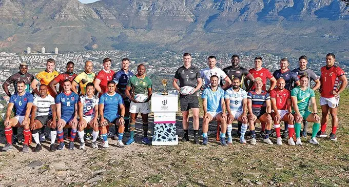 Fiji Airways Fijian sevens men’s captain Waisea Nacuqu (sitting second from left) with the rest of the team captains lined up in front of majestic Table Mountain in Cape Town on September 7 as excitement reaches fever pitch ahead of the highly anticipated Rugby World Cup Sevens 2022, which takes place at the Cape Town Stadium from today. Photo: World Rugby.