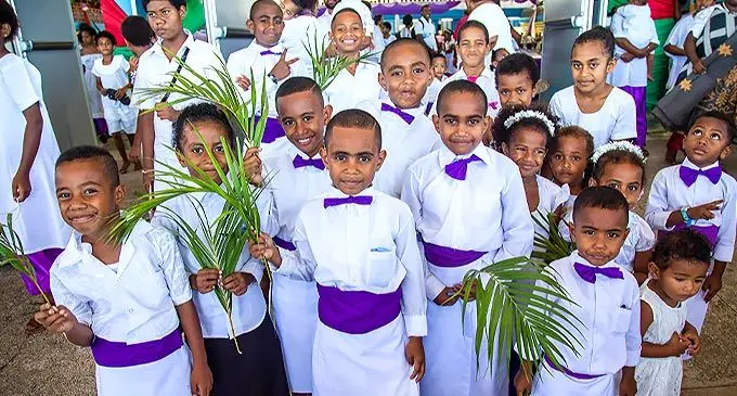 Children of the All Nations Church after their service during Palm Sunday service at the Vodafone Arena on April 10, 2022. Photo: Leon Lord