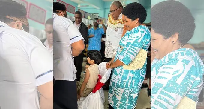President Ratu Wiliame Katonivere (second from right) with the First Lady, Filomena Katonivere (closest to camera), watch as children are vaccinated against COVID-19 at Nehru Memorial Primary School in Toorak, Suva on July 6, 2022. Photo: Nolishma Narayan