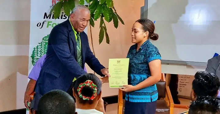 Forest Supervision Training (module 1) graduate Maria Rosi (right and insert), during the graduation ceremony at the Ministry of Forestry office in Labasa recently. Photo: Sampras Anand