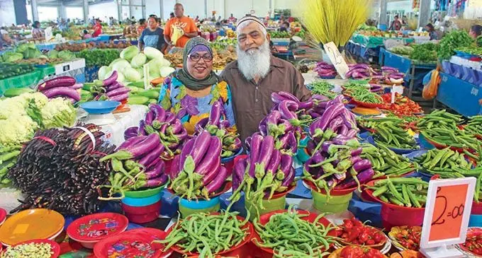  Nausori market vendor Abdul Shameem (right) and his wife Zabin Bibi at their stall at Nausori market on July 17, 2019. Photos: Wati Talebula 
