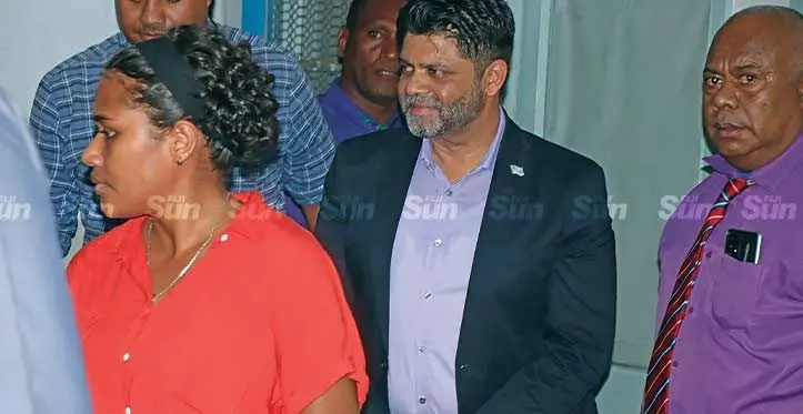 The former Attorney-General, Aiyaz Sayed-Khaiyum (second from right), o u tside the Totogo Police Station in Suva on May 1, 2023, where he is held in remand. Photo: Jone Salusalu
