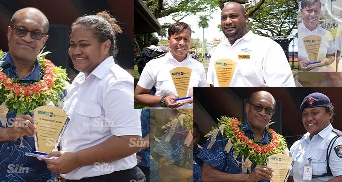 2019 Maritime Day celebration special award recipients from left: Minister for Infrastructure, Transport, Disaster Management and Meteorological Services, Jone Usamate awards Sainimere Qutonilaba, Constable Vuli Drodro and Melanaia Taliadrodro at Ratu Sukuna Park in Suva on September 27, 2019. Photo: Ronald Kumar