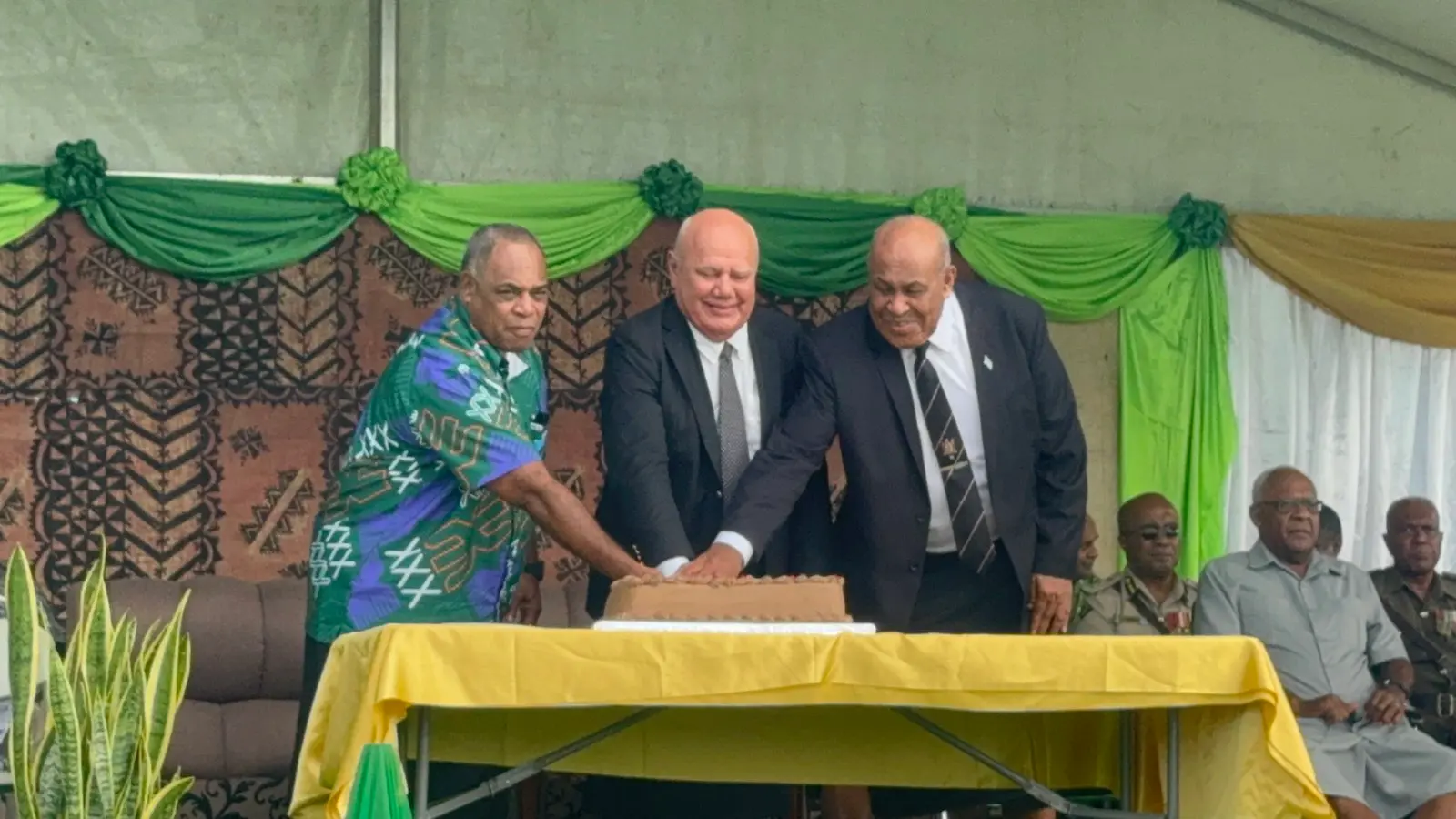 Tui Vitogo, Ratu Jone Sovasova, Deputy Prime Minister, Viliame Gavoka and Minister of iTaukei Affairs, Ifereimi Vasu cut the celebration cake at Churchill Park in lautoka.