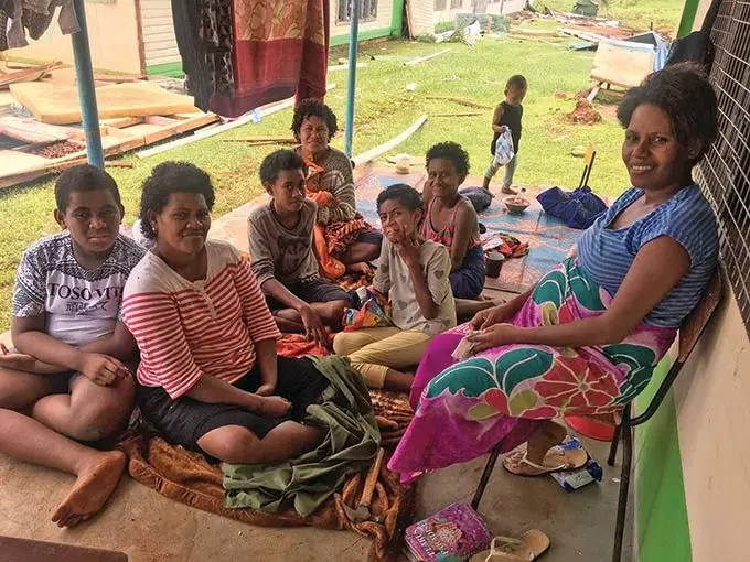 Pregnant mother Silina Baleloa (right) with Votua villagers: Tubutubu Ratu, Loalive Motovuna, Viniana Rakibulu, Kelera Viseai, Akuila Ratu, Oripa Hadassh Villiame Kinikinilau and Seniana Mavi at Lekutu Secondary School in Bua on December 18, 2020.   Photo: Renu Radhika
