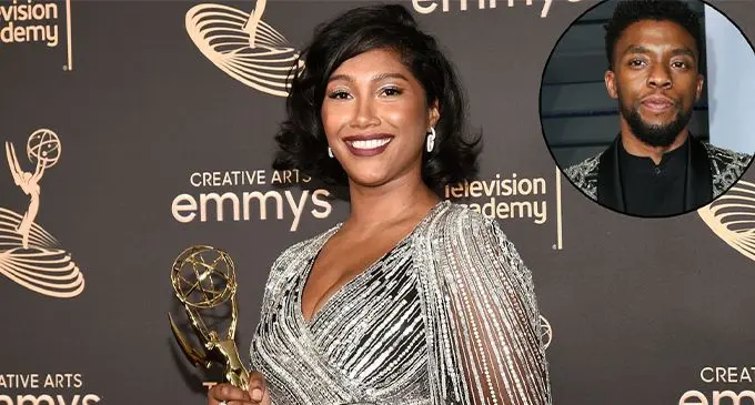 Taylor Simone Ledward accepts the emmy on behalf of her husband Chadwick Boseman. Photo: E News