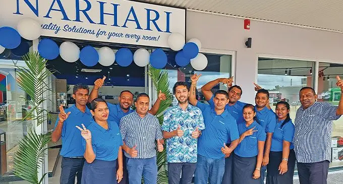 Narhari Electricals associate director, Dylan Harikisun, with staff of Narhari branch at Damodar City complex in Labasa on April 5, 2024 Photo: Sampras Anand