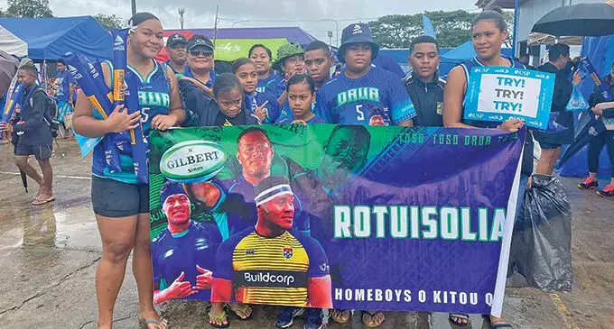 Ro Jone Roseru (back second from left) with his family at the HFC Bank Stadium on June 3, 2023. Photo: Sophie Norris