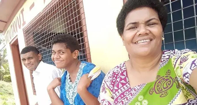 Vinea Toga (right) with her two children.
