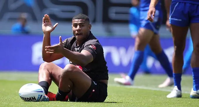 Vodafone Fijian Bati hooker Joe Lovodua does the Fijian traditional ‘cobo’ gesture after scoring the team’s first try.  