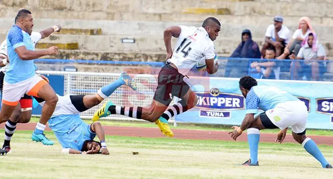 Nadroga's right wing Nacanieli Narekuva push away his opposite number Alipate Tule of Suva during Skipper Cup Championship at ANZ Stadium on May 4, 2019. Photo: Ronald Kumar.