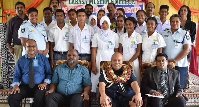 Police Chief Operations Officer, Acting ACP Maretino Qiolevu (sitting second from the right-sitting) with invited guests, teachers and students who were inducted for the scholastic crime stoppers programme at Labasa Muslim College. Photo: Shratika Naidu.