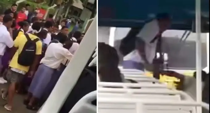 Screenshot of the students boarding a bus and threatening the bus checker and driver at the University of the South Pacific bus stop in Laucala Bay. Source: FB