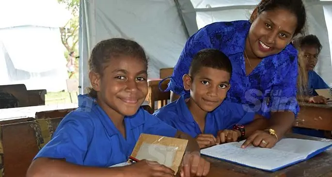 Dreketi Primary School teacher Noleen Singh teaching Shanav Sunil and Grace Senimili on January 19, 2021. Photo: Shratika Naidu
