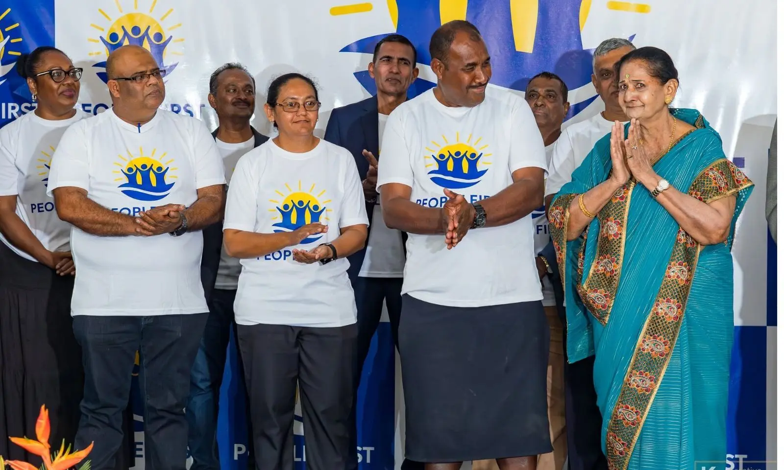 Mohammed Saiyaz Khan, People First Party candidate (left), with Kalesi Volatabu, People First Party candidate, standing behind him, alongside other candidates in Suva. 