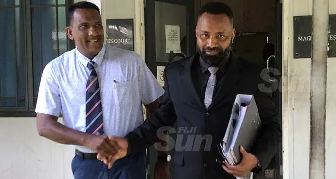 Mohammed Talib Khan and his lawyer John Rabuku outside the Magistrates Court in Suva on April 7, 2021. Photo: Ashna Kumar