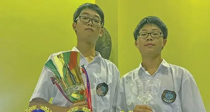 Year 12 Dux Award recipient, David Qiu (left), with his younger brother, Year 10 student Ivan Qiu. Photo: Kelera Sovasiga