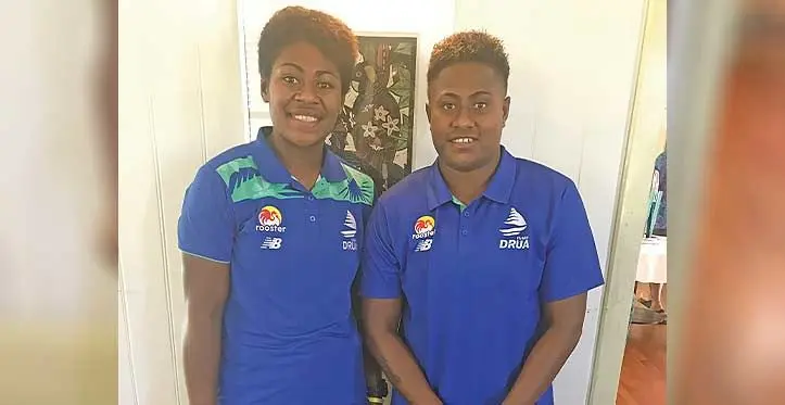 Rooster Chicken Fijiana Drua second five eight Merewai Cumu (right) with her niece and locks Mereoni Nakesa at the Australian High Commission in Tamavua, Suva on May 12, 2023. They both hail from Vunamoli, Nadi. Photo: Sereana Salalo.
