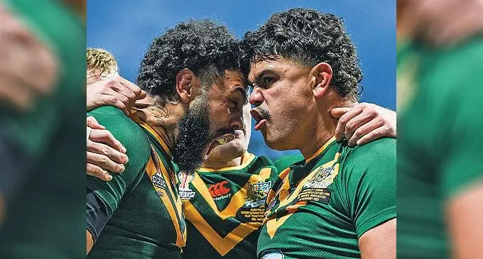 Australia’s (left-right) Josh Addo Carr and Latrell Mitchell celebrate their Rugby League World Cup’s 30-10 win over Toa Samoa in the final in England on November 19, 2022. Photo: NRL.com