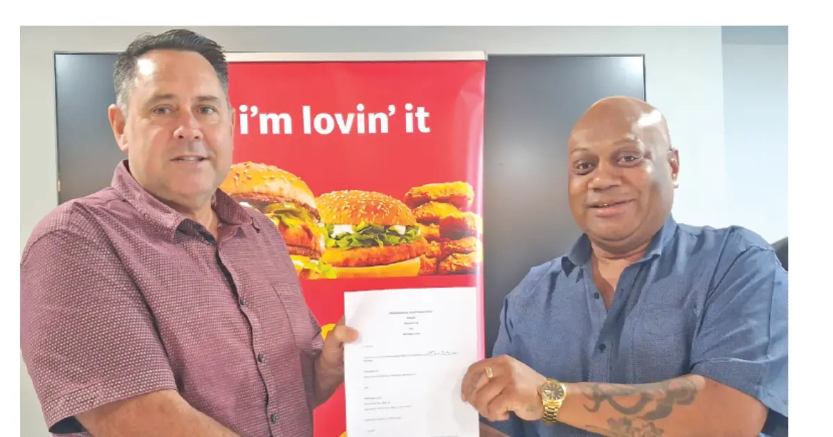 McDonald’s Fiji managing director Marc McElrath (left) with Nadi Rugby Union president Ponijese Lou during the presentation in Nadi on July 27, 2026. Photo: Waisea Nasokia