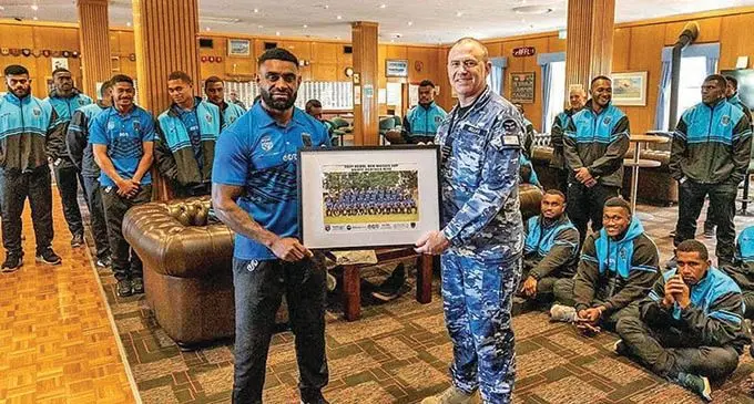 Kaiviti Silktails head coach Wes Naiqama receives a gift from the Royal Australia Air Force (RAAF) Richmond Base in Sydney, Australia. The Silktails were take on a tour around the the RAAF base. Photo: Kaiviti Silktails