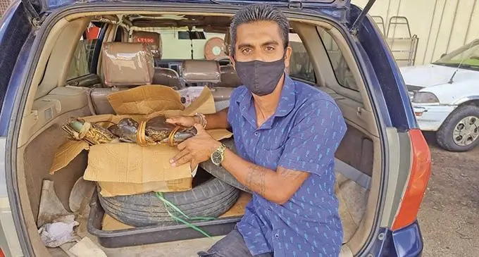 Ramendra Prasad sells sea crabs at Labasa Town on September 13, 2021.   Photo: Sampras Anand