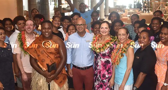 Sheraton Fiji Resort and Sheraton Denarau Villas at Marriott International complex hotel manager Sudhir Yadav (front row, blue shirt, middle) with guests and staff during the reopening of Sheraton Fiji Golf & Beach Resort on March 16, 2022. Photo: Waisea Nasokia