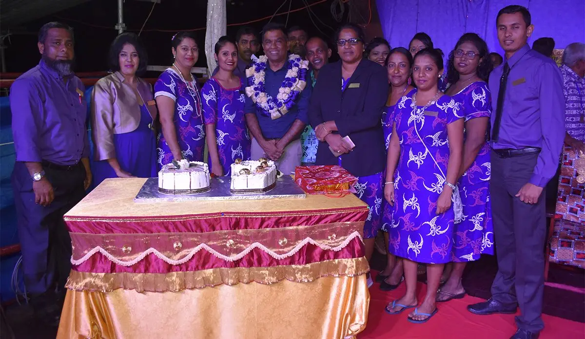 Vodafone Fiji Limited Head of eCommerce and Corporate Affairs Shailendra Prasad (middlle) with teachers during  the Bulileka Sanatan College golden jubilee celebration in Labasa on April 18, 2019.  Photo:Shratika Naidu