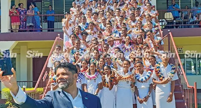 The Attorney-General and Minister for Economy, Aiyaz Sayed-Khaiyum takes a selfie with the student leaders of Tavua College following the school’s prefects’ induction on May 6, 2022 Photo: Nicolette Chambers