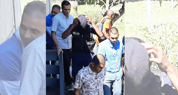 Marc Winston Tijinkonkoen (back left), Shaneil Suresh Autar and Roshneel Kumar (wearing grey floral shirt) and Pravishek Kartik Narayan (second from front in blue bula shirt) are escorted by Police at the High Court in Lautoka Photo: Salote Qalubau. 