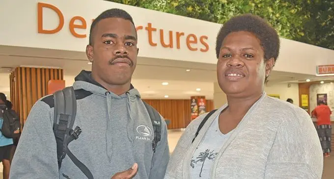 Fiji Airways Fijian Drua rep Osea Waqa (left) and mother Sereima Sevesa at the Nadi International Airport on August 28, 2019. Photo: Waisea Nasokia